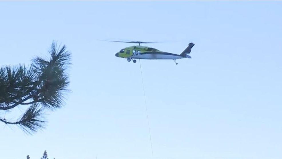 Image for story: NV Energy replacing power poles at Lake Tahoe and doing fire mitigation using helicopters