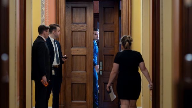 President-elect Donald Trump's nominee to be attorney general, former Rep. Matt Gaetz, R-Fla., closes a door to a private meeting with Vice President-elect JD Vance and Republican Senate Judiciary Committee members, at the Capitol in Washington, Wednesday, Nov. 20, 2024. (AP Photo/J. Scott Applewhite)