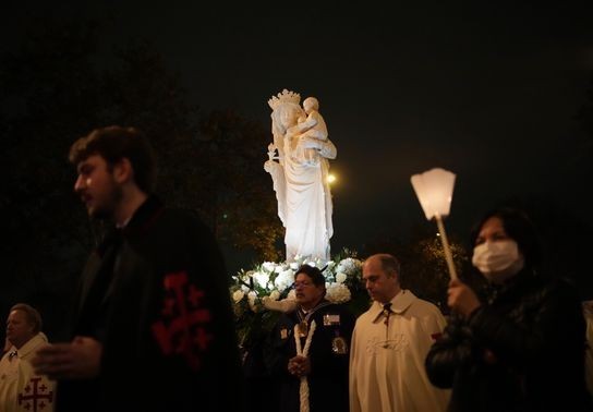 Image for story: Virgin Mary statue returns to Notre Dame Cathedral 5 years after devastating fire